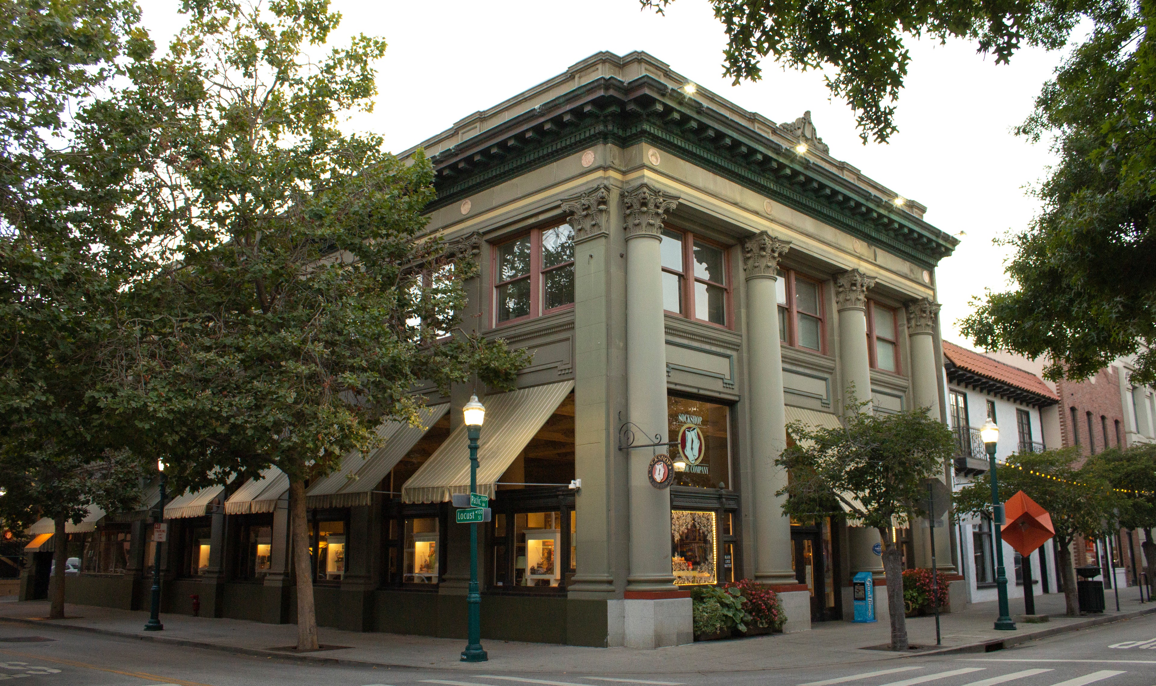 A photograph of the Sockshop & Shoe Co storefront in Downtown Santa Cruz on the corner of Locust and Pacific. 