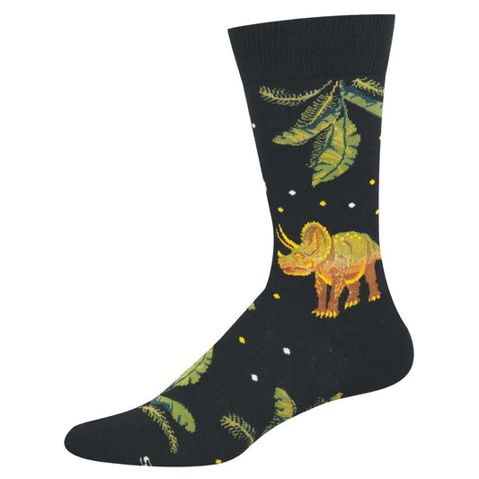 A black sock with triceratops and jungle leaves